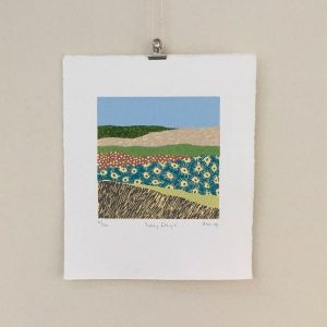 a hand-crafted collage print of a landscape