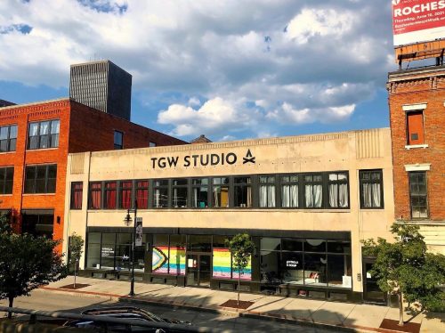 TGW Studio: its windows covered in post-it notes so they create the Inclusive Pride flag